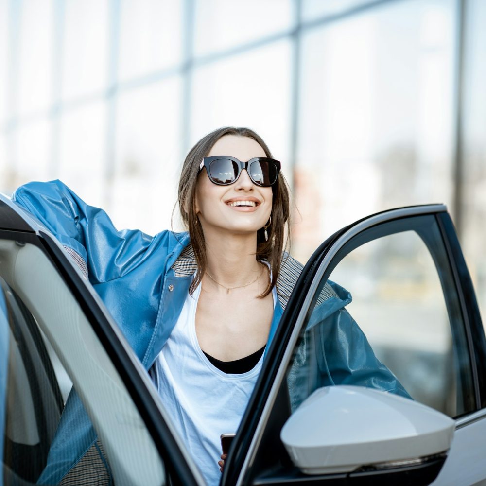 Woman near the car outdoors